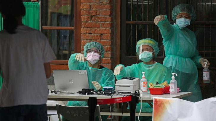 Taiwan struggles with testing backlog amid largest outbreak