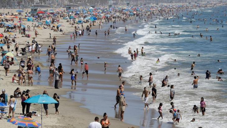 Californians hit beaches, travel ahead of virus rules easing