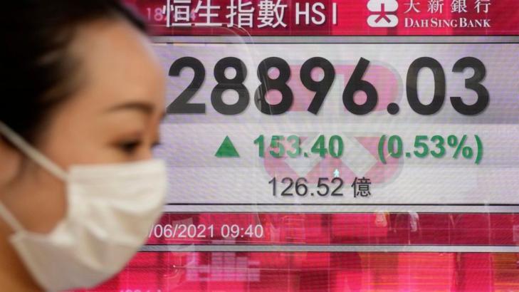Asian shares advance as investors await US inflation data