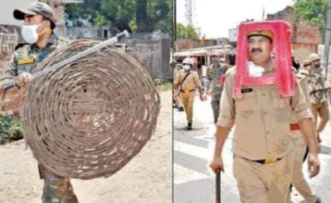 UP Cops Wear Red Plastic Stool, Wicker Basket As Riot Gear In Protest