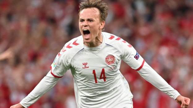 Russia 1-4 Denmark: Danes to face Wales after emphatic and emotional victory