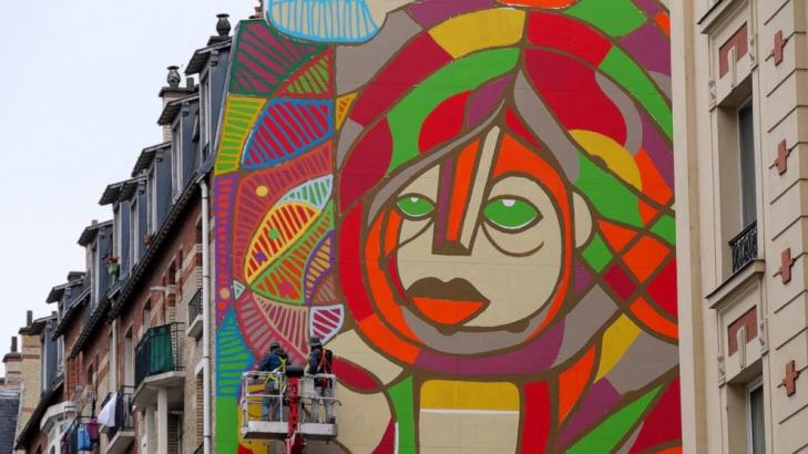 American, French artists revive hope on giant Paris mural