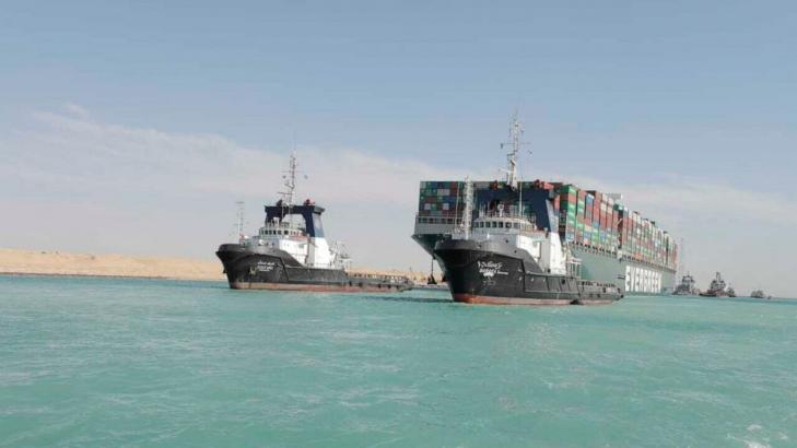 Suez Canal says deal reached to free seized vessel