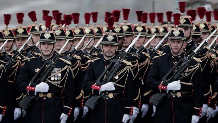 France cautiously celebrates Bastille Day, clouded by virus