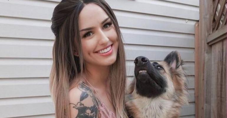 Man just wants his nudist GF to throw on some clothes around the dog (7 Photos)