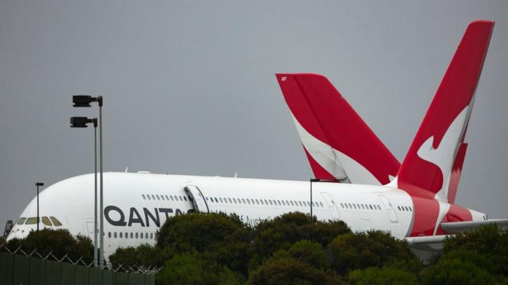 Qantas posts $1.7 billion loss and tips travel by Christmas