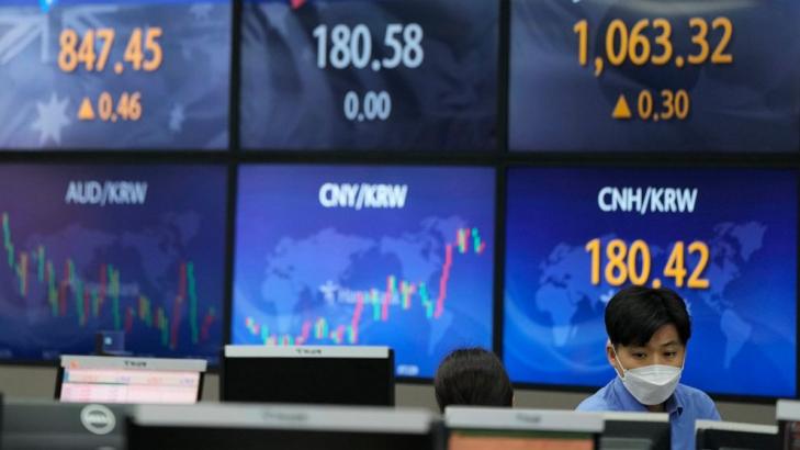 Asian stocks mixed ahead of possible Fed guidance