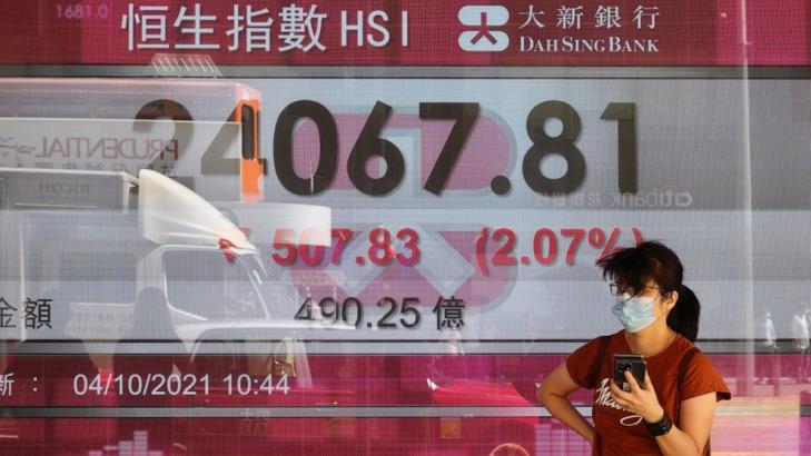 Asian markets mixed; China Evergrande shares suspended