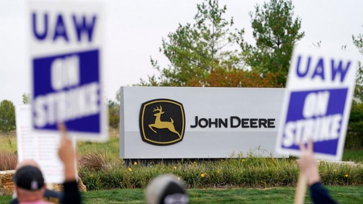 Deere, UAW reach tentative pact; strike continues for now