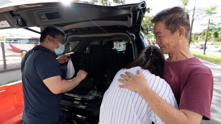 Joyful reunions as Malaysia-Singapore land border reopens