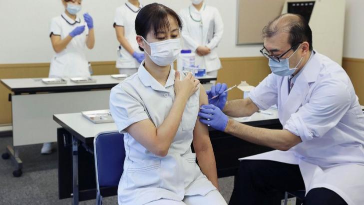 Japan starts booster COVID vaccinations amid omicron scare