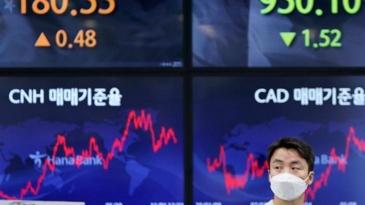Asian shares skid, tracking Wall Street retreat