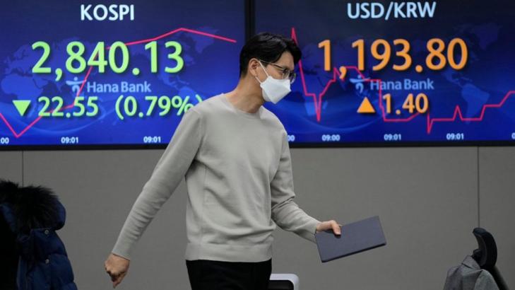 Asian shares slide after more losses on Wall Street