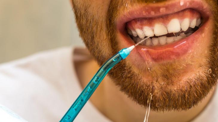 Are Waterpiks Really Better Than Traditional Floss?