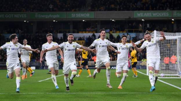 Wolves 2-3 Leeds: Visitors fight back against 10 men to earn bruising win