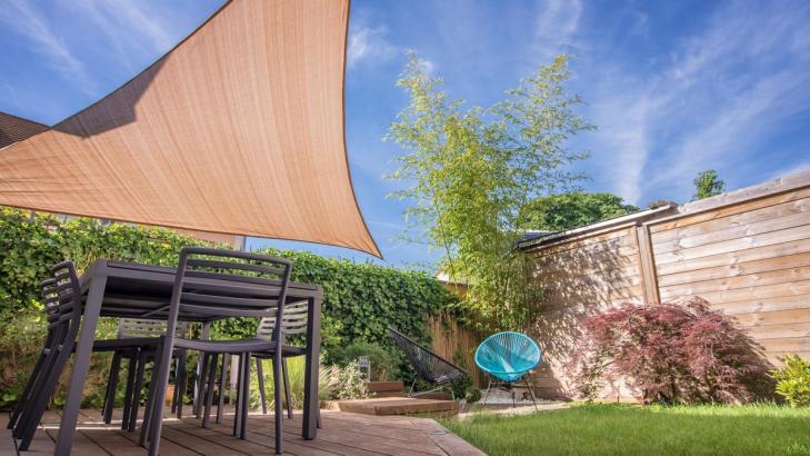 How to Install a ‘Shade Sail’ in Your Backyard (and Why You Should)