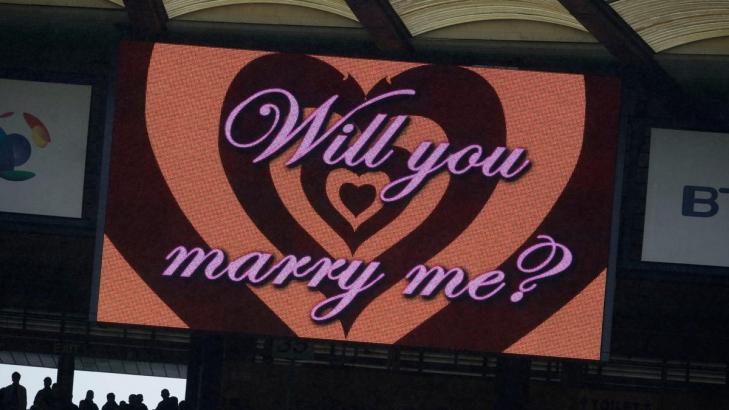 What It Really Costs to Propose on a Jumbotron (and Better Ways to Spend That Money)