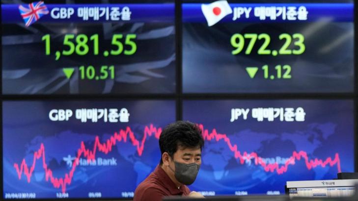 Asian shares mixed in light 'Golden Week' trading