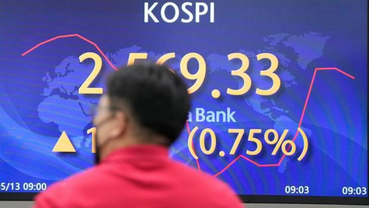 Asian shares bounce back, shrugging off inflation concerns