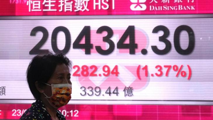 Asian shares mixed after Wall St barely misses bear market