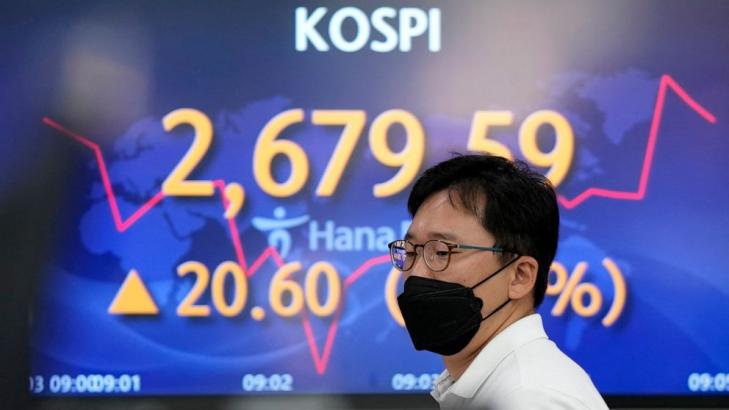 Asian shares rise, China trading closed for national holiday