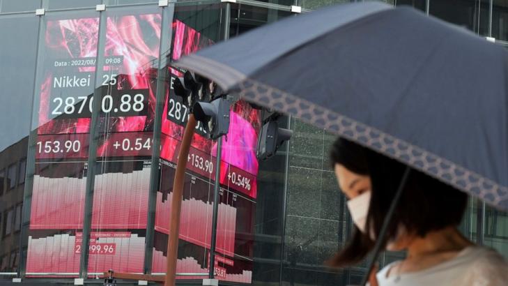 Asian shares mixed after China cuts key rate, Japan GDP up