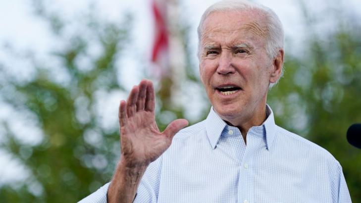 Biden to channel Kennedy in his push for a cancer 'moonshot'