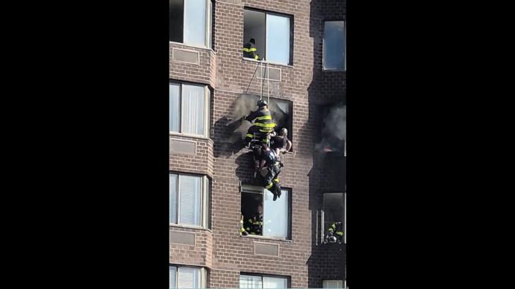 38 hospitalized after fire breaks out in high-rise apartment building