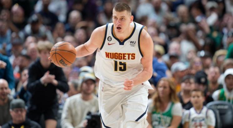 Jokic records triple-double, Nuggets top Celtics after rim delay