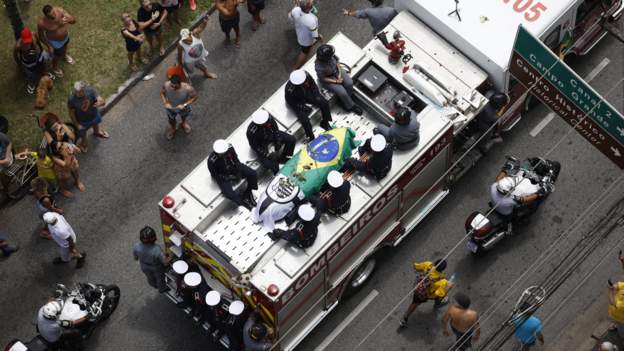 Pele's funeral: Thousands line streets of Santos as Brazil football legend is laid to rest