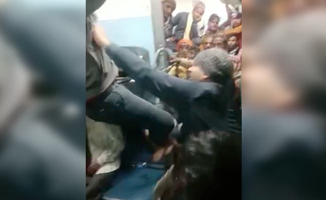 Video: Train Ticket Checkers Beat Up Passenger, Boot Him In The Face