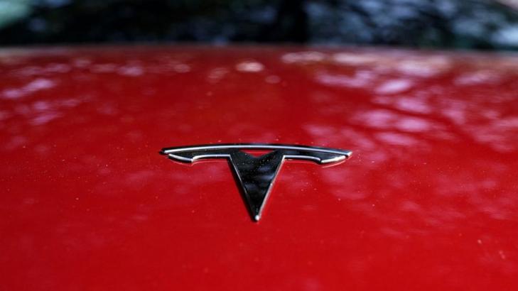 Tesla says production innovation to cut auto costs by half