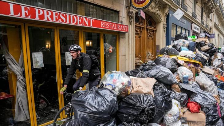 French protests drag on after Macron's pension plan push