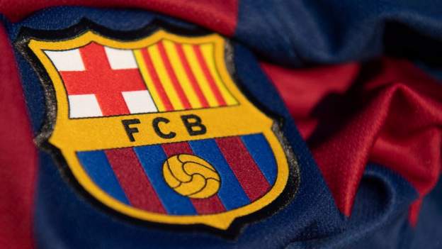 Uefa to investigate Barcelona over payments to former referees' official