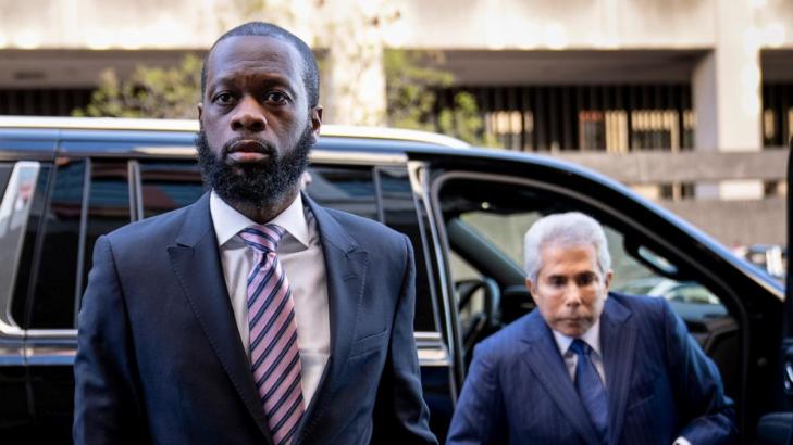 Fugees rapper in political conspiracy trial launches defense