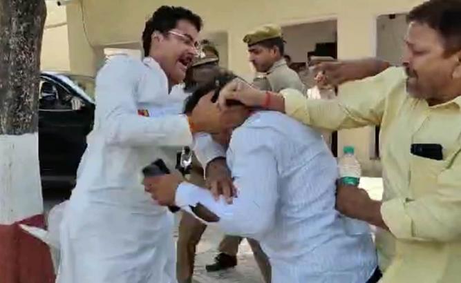 Watch: Samajwadi MLA Thrashes BJP Leader's Husband In Police Station