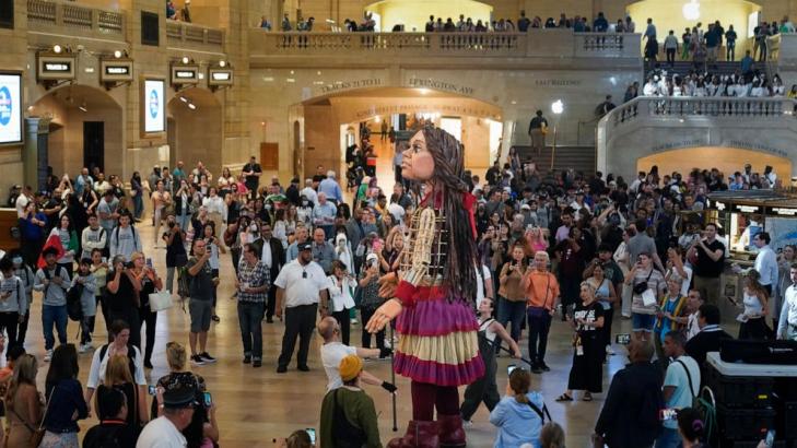 Little Amal, a 12-foot puppet of a Syrian refugee, will travel the US