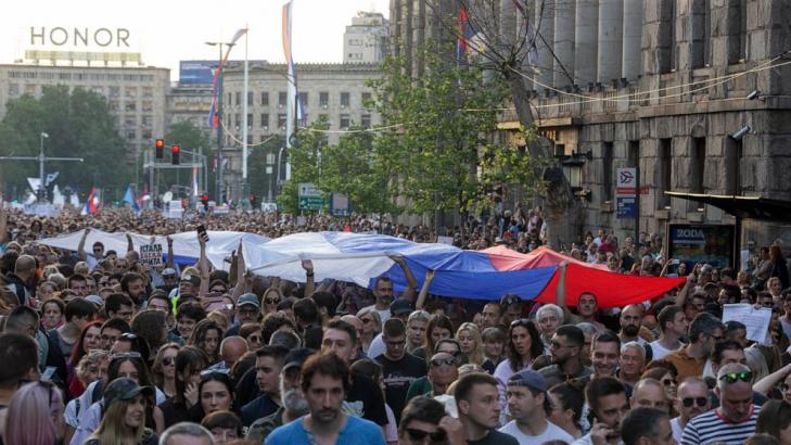 Serbia's president promises early election amid large protests against his populist rule