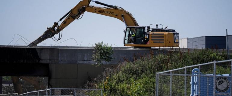 In the effort to reopen I-95 in Philadelphia, crews get some help from a NASCAR fan