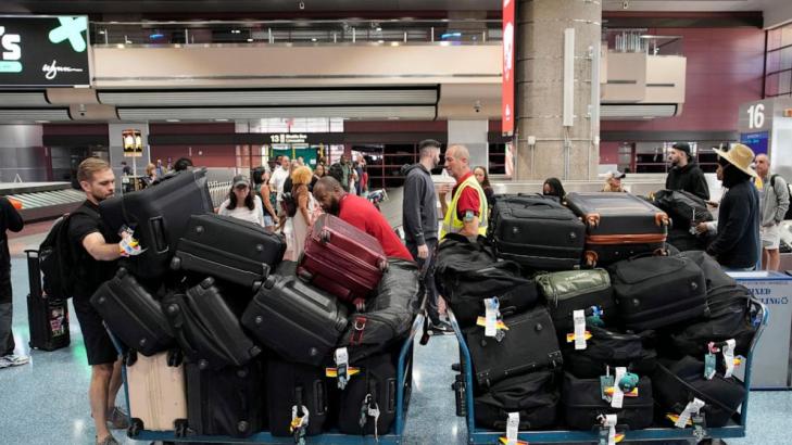 Layover, cramped seating, security lines: A day with players on a WNBA commercial flight