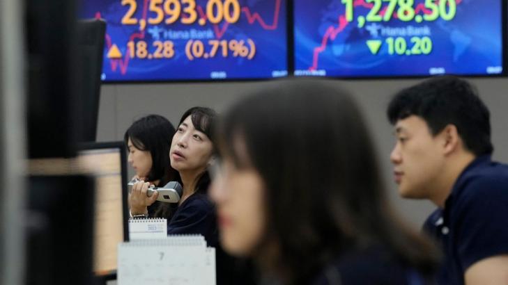 Stock market today: Asian shares jump on Wall Street's return to its highest level in over a year