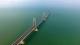 Los turistas chinos cruzan el puente marítimo más largo del mundo y Hong Kong colapsa